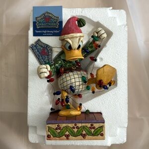 Disney Traditions Jim Shore “Santa’s High Strung Helper”
